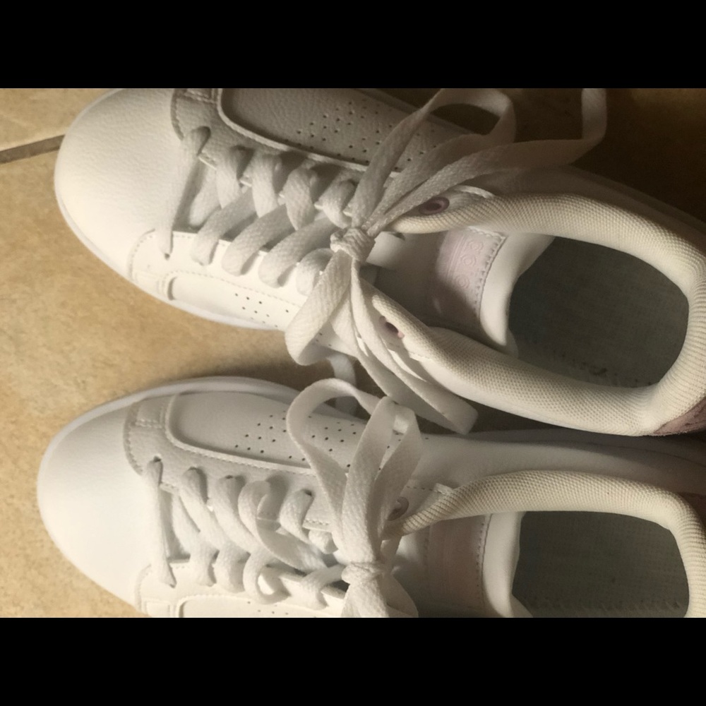 Women’s adidas shoes with pink accents